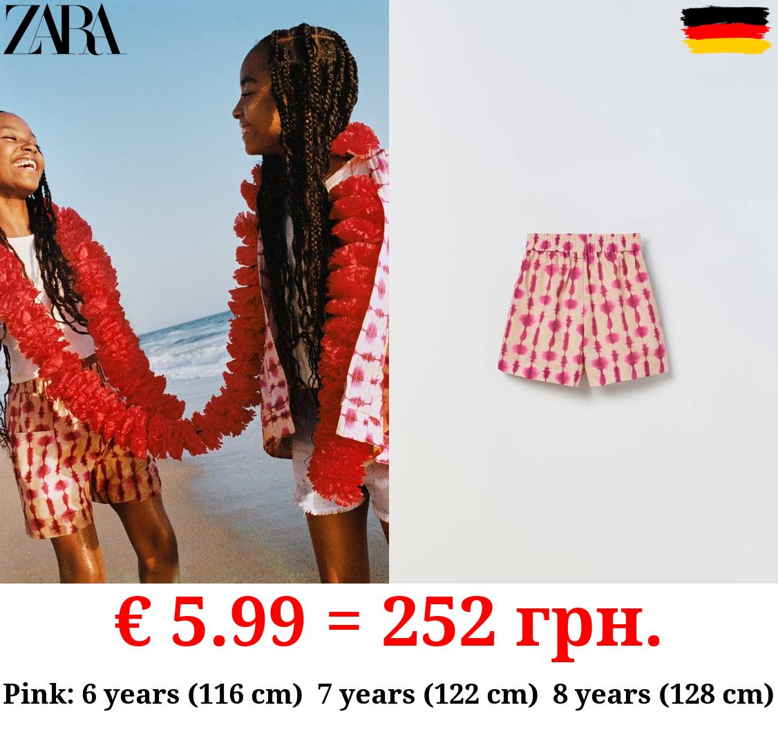 PRINTED BERMUDA SHORTS