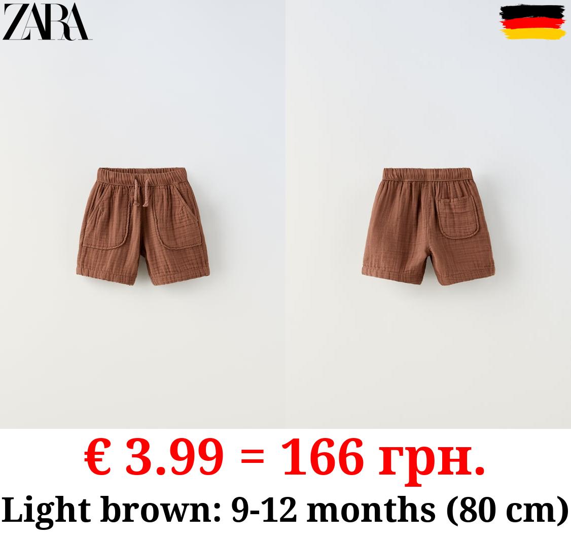 TEXTURED DRAWSTRING BERMUDA SHORTS