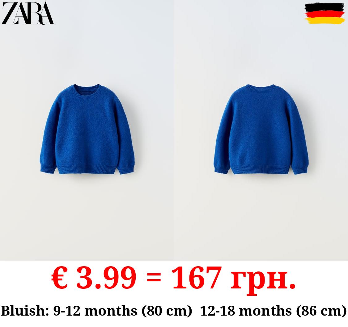 SOFT TOUCH KNIT SWEATER