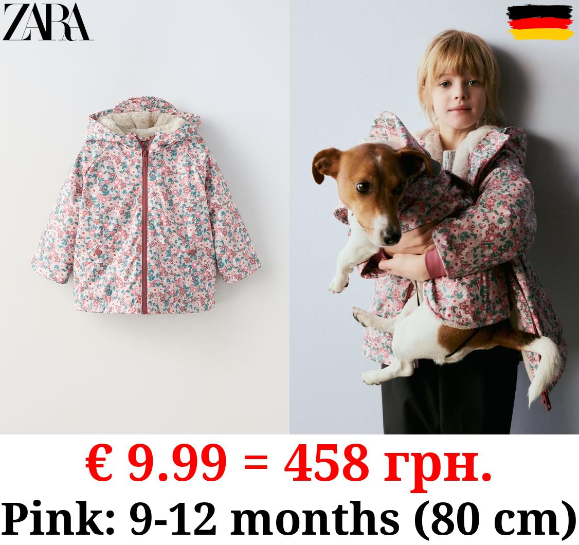 RUBBERISED FLORAL RAINCOAT