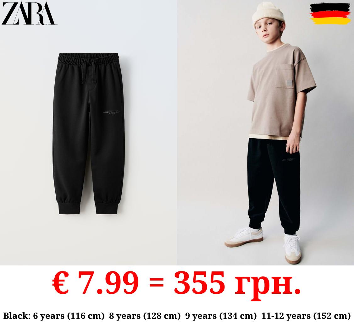 PLUSH TROUSERS WITH SLOGAN