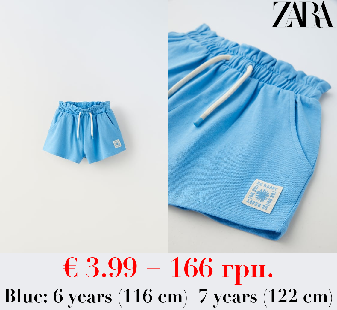 PLUSH BERMUDA SHORTS WITH LABEL DETAIL