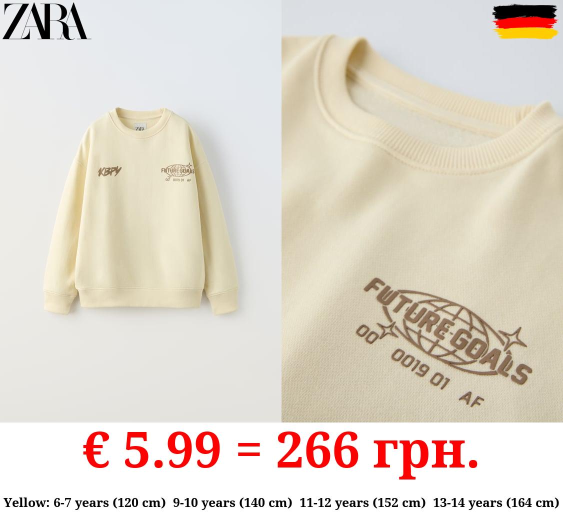 SWEATSHIRT WITH RAISED SLOGAN