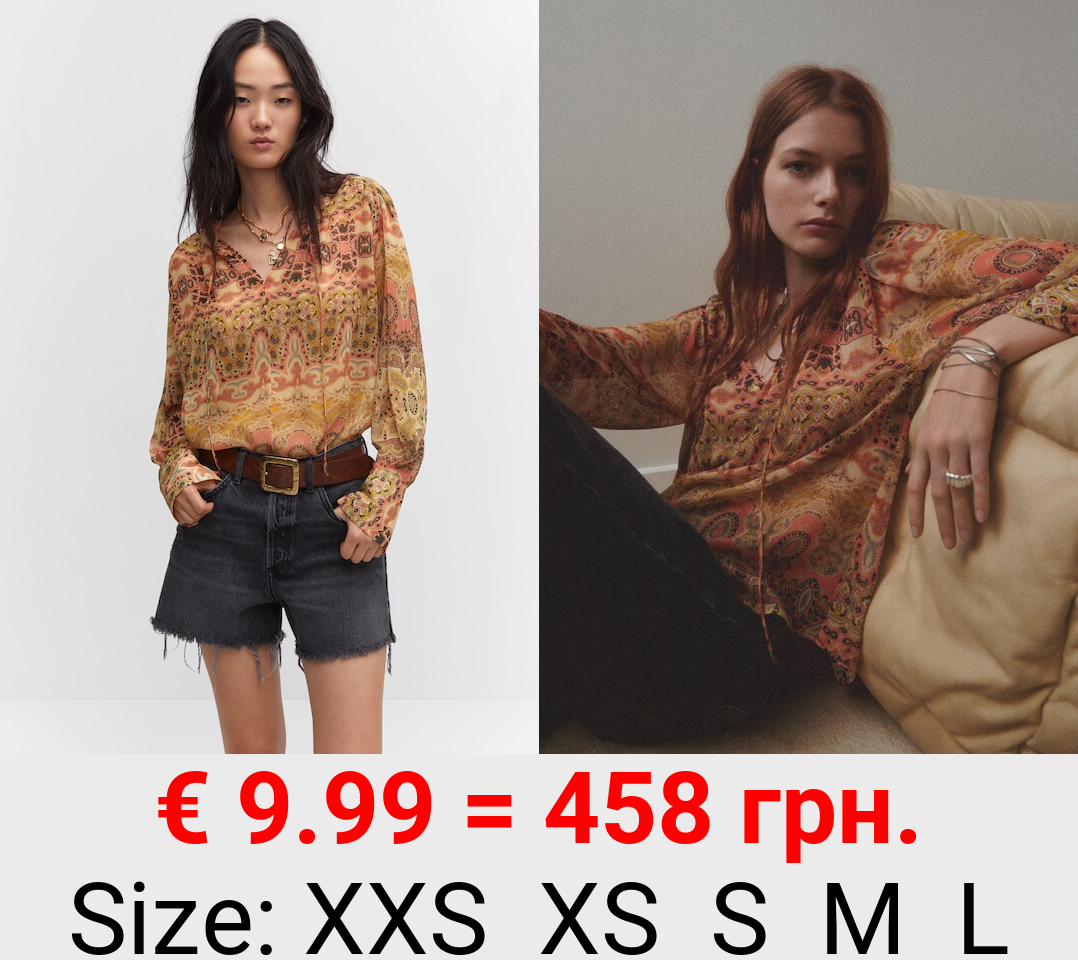 Blusa estampada cierre lazo