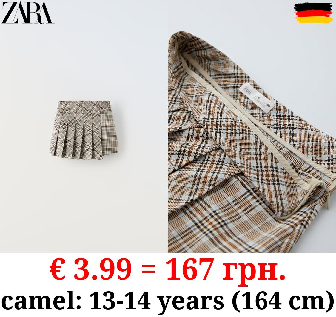 ASYMMETRIC BOX PLEAT SKIRT