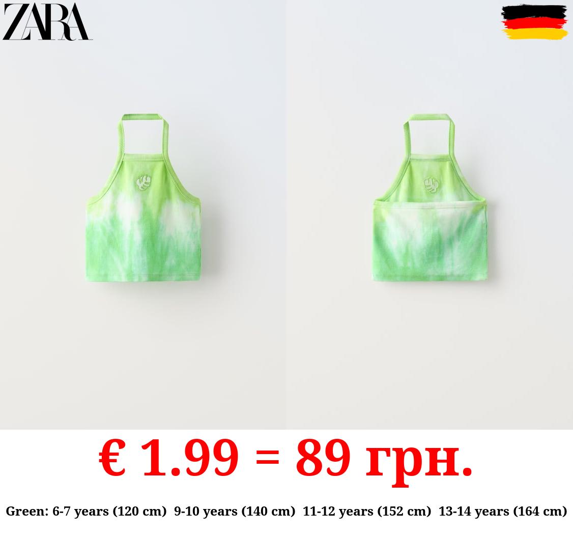 TIE-DYE TOP WITH CUT-OUT DETAIL