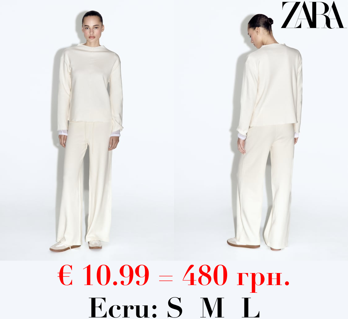 SOFT SWEATER WITH FRONT SEAM