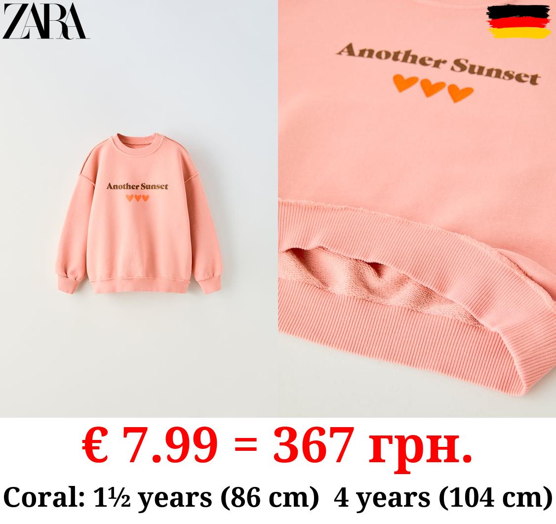 GARMENT DYE SLOGAN SWEATSHIRT
