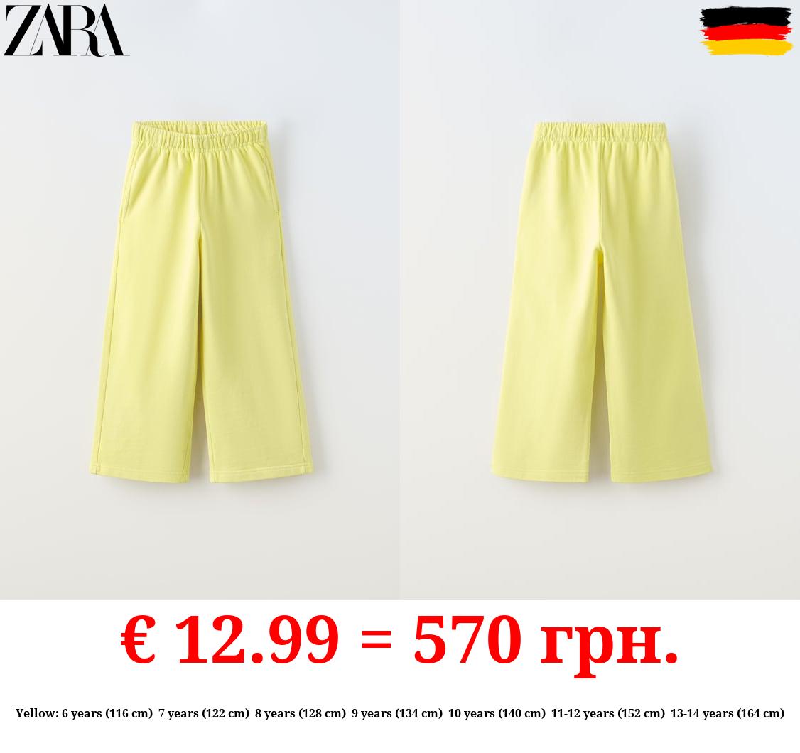 WIDE-LEG FADED-EFFECT JOGGING TROUSERS