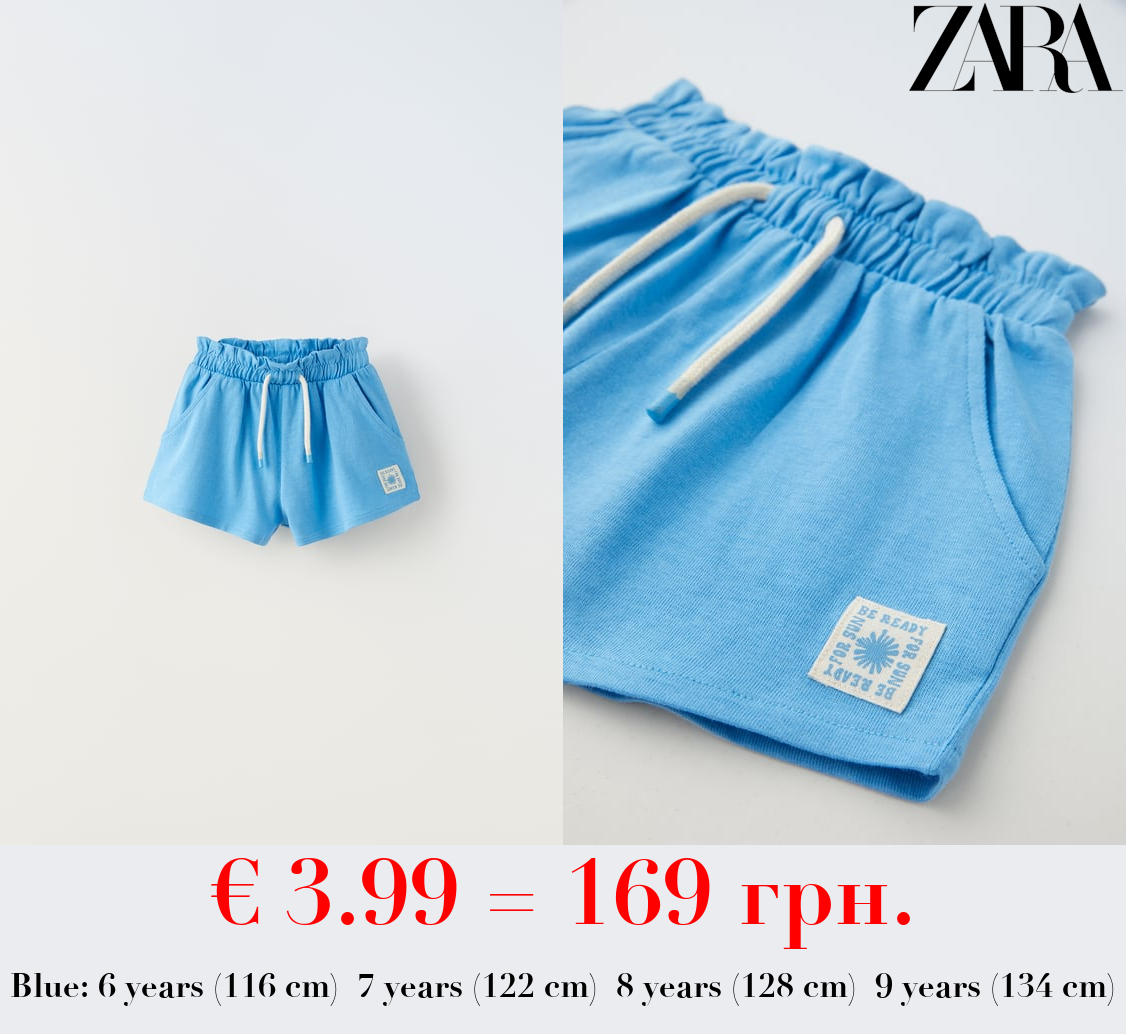 PLUSH BERMUDA SHORTS WITH LABEL DETAIL