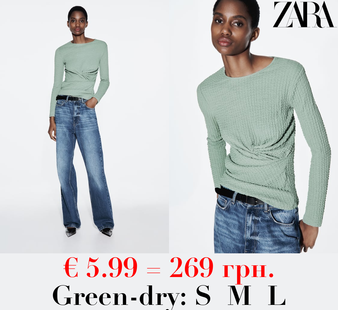 TEXTURED TOP WITH GATHERED DETAIL