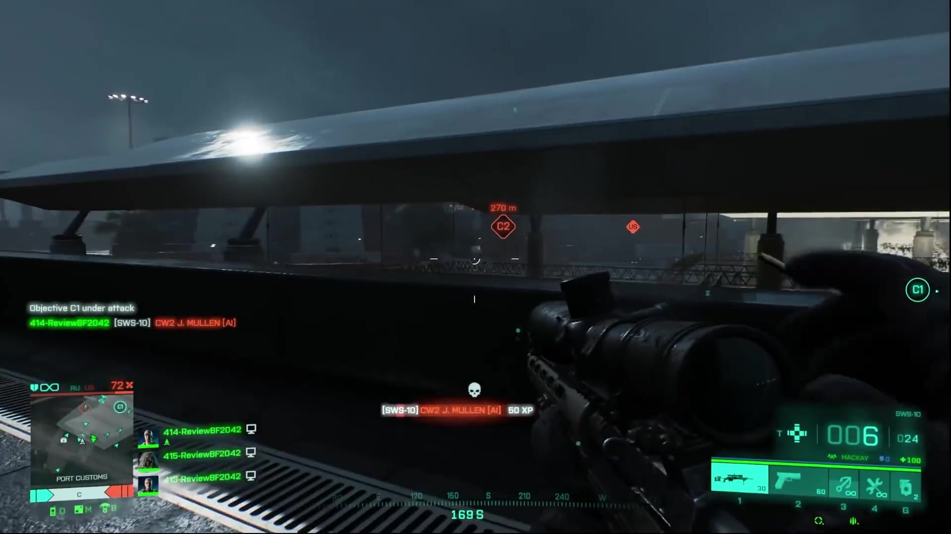 A soldier shoots a missile launcher at an approaching enemy tank, the explosion illuminating the night sky.