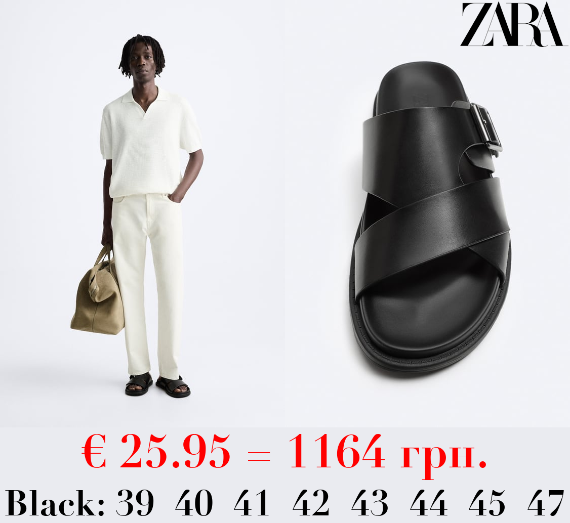 Criss-cross sandals with buckle