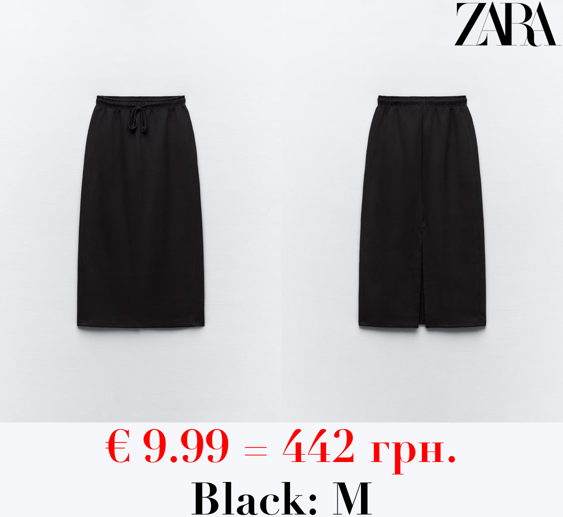 CLEAN INTERLOCK PLUSH MIDI SKIRT