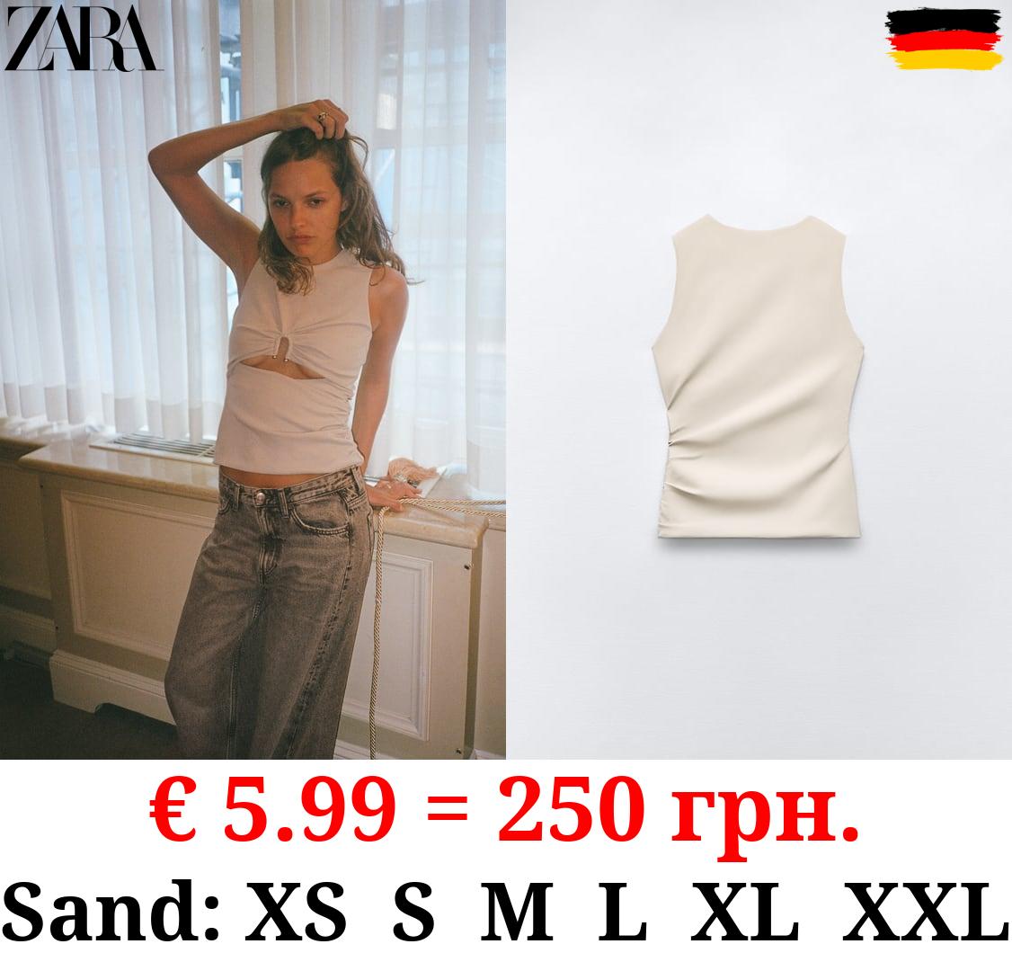 STRETCH TOP WITH CUT-OUT DETAIL