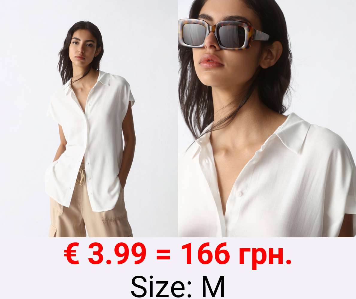 Flowing sleeveless shirt