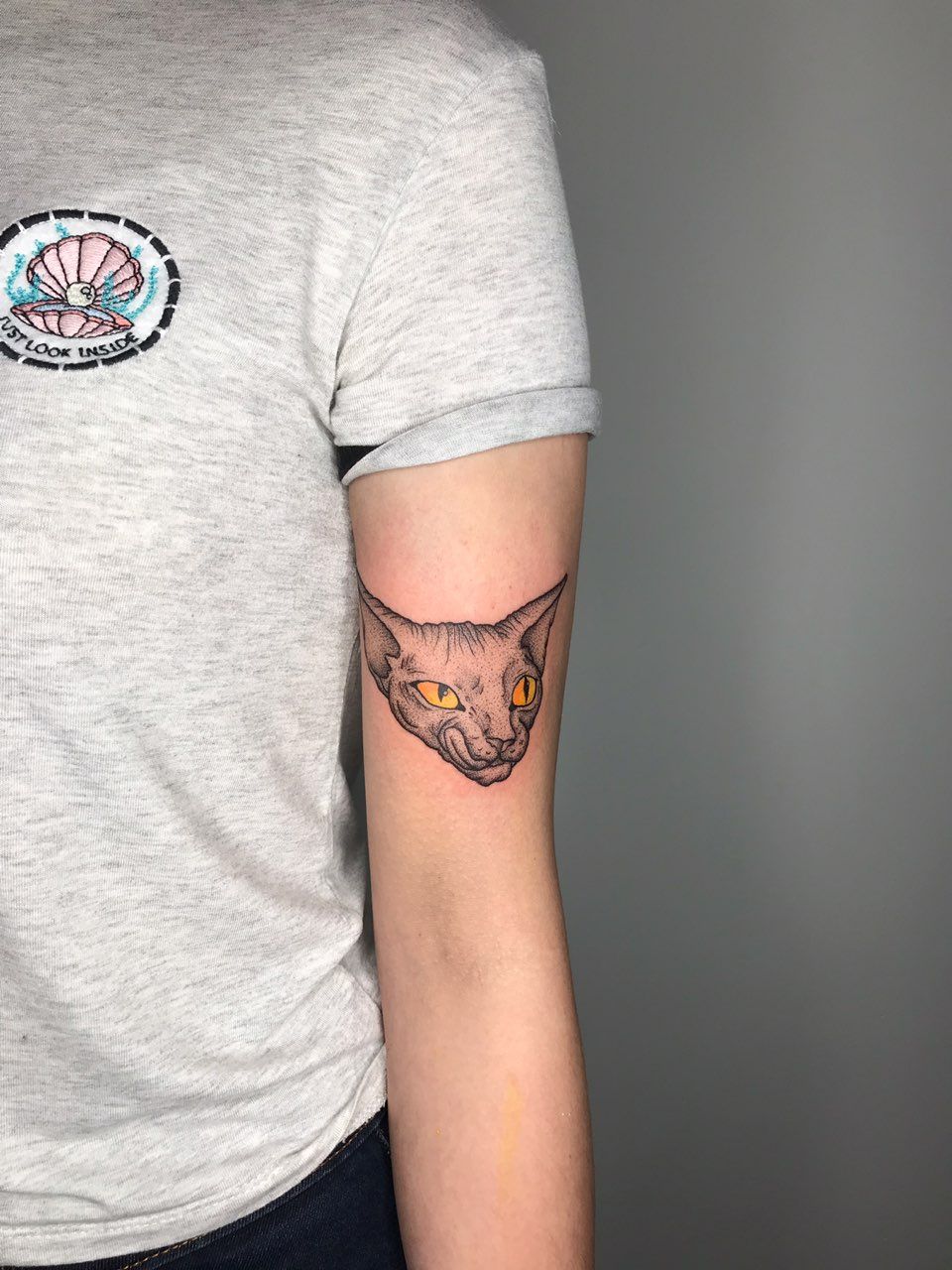 Kosmo tattoo