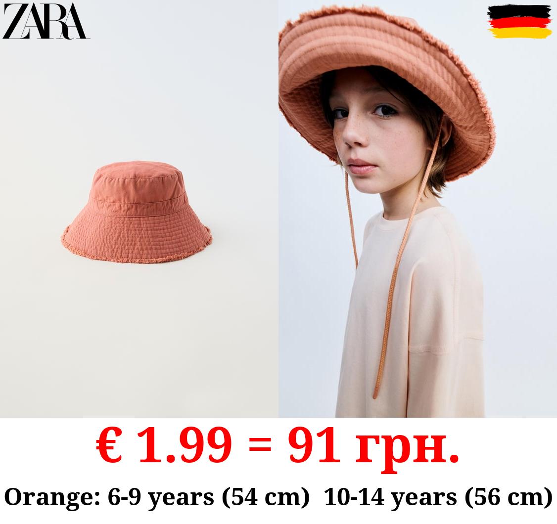 TRUE NEUTRALS BUCKET HAT WITH FRINGE