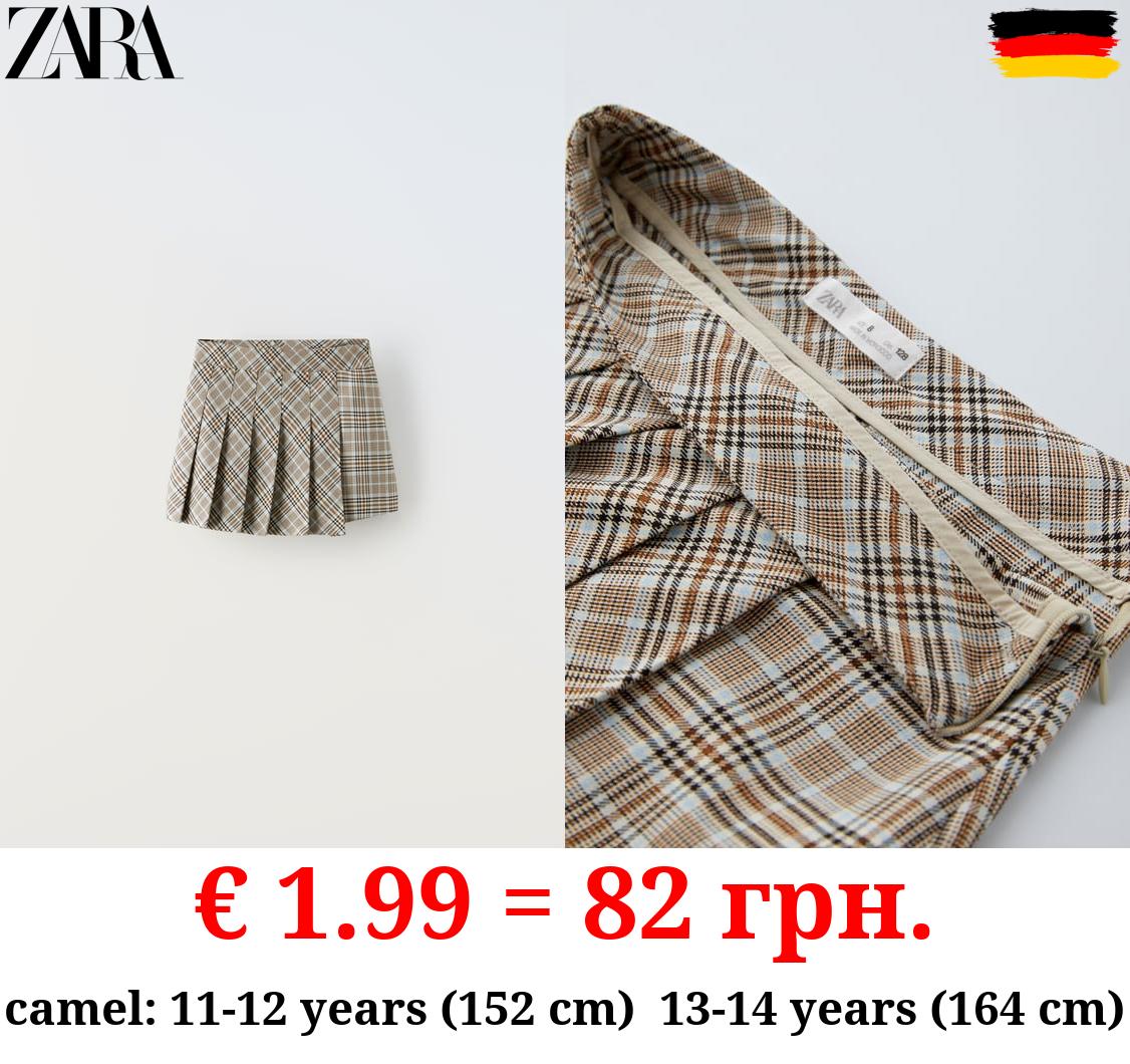 ASYMMETRIC BOX PLEAT SKIRT