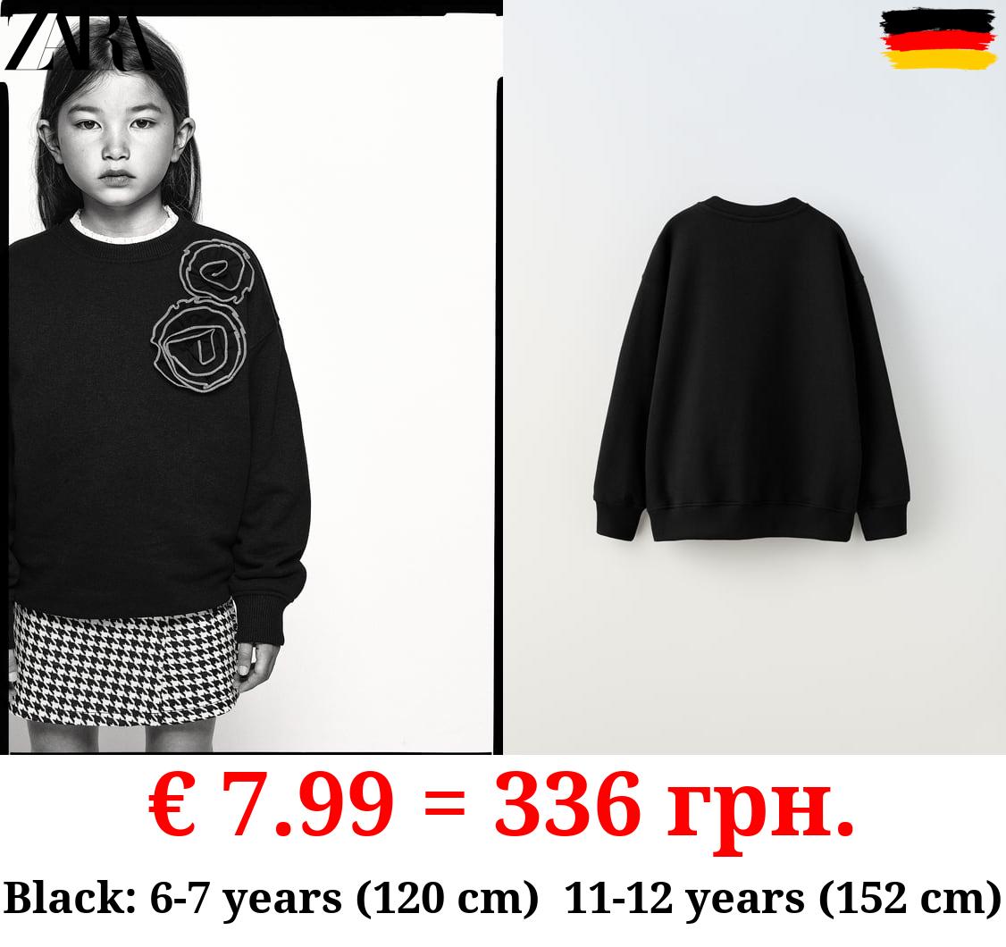 CONTRAST FLORAL SWEATSHIRT