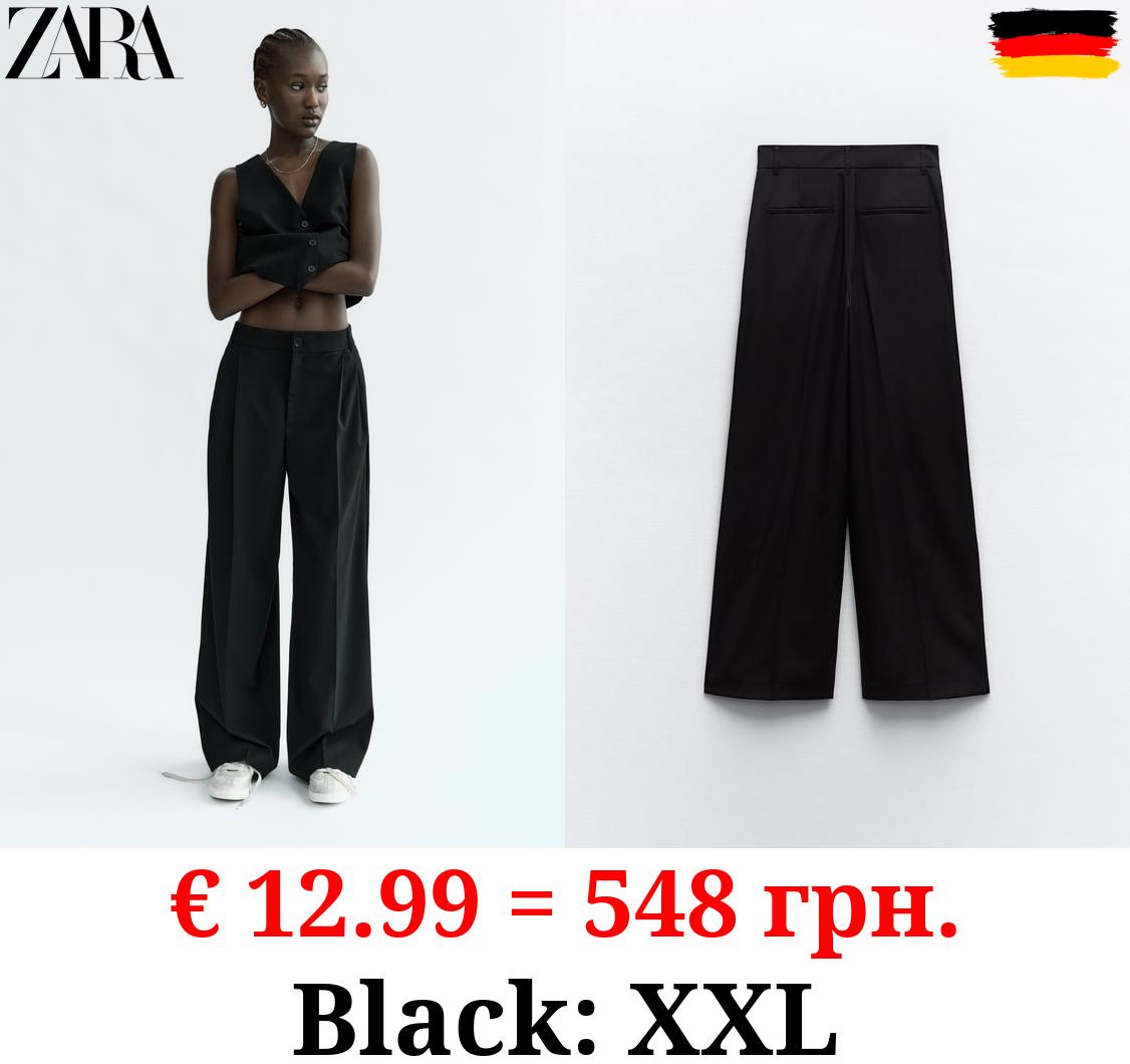 FULL-LENGTH PLEATED TROUSERS