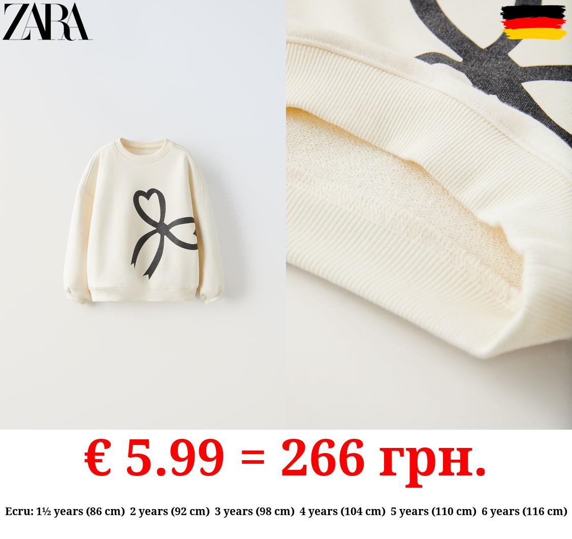 PRINTED SWEATSHIRT WITH SHINY BOW