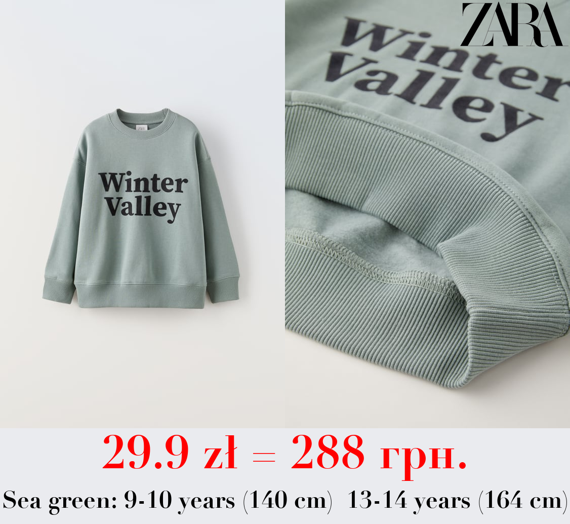 FLOCKED SLOGAN SWEATSHIRT