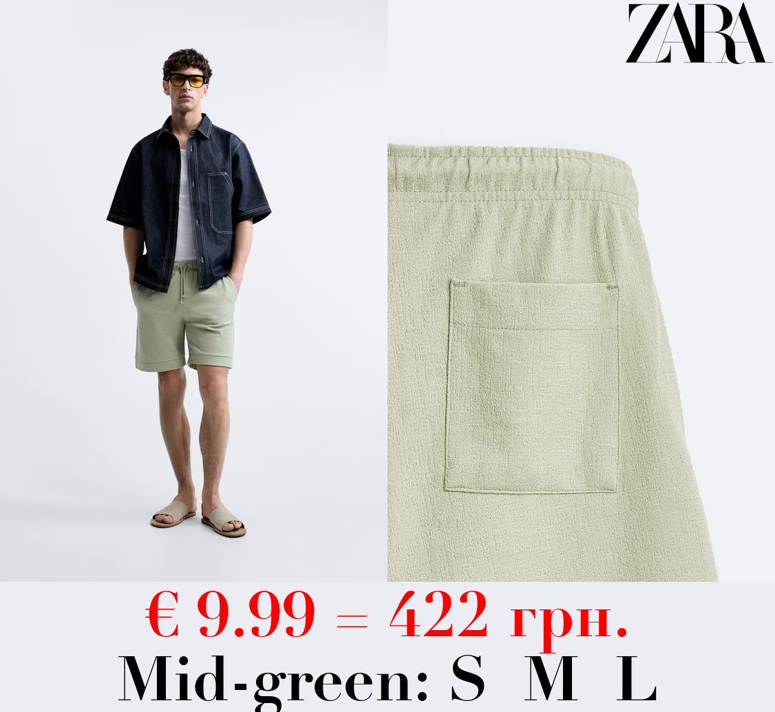 TEXTURED JACQUARD BERMUDA SHORTS