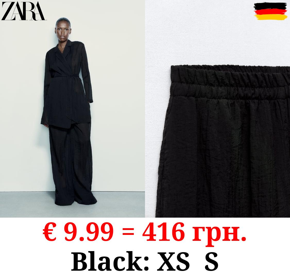 MINIMALIST PALAZZO TROUSERS