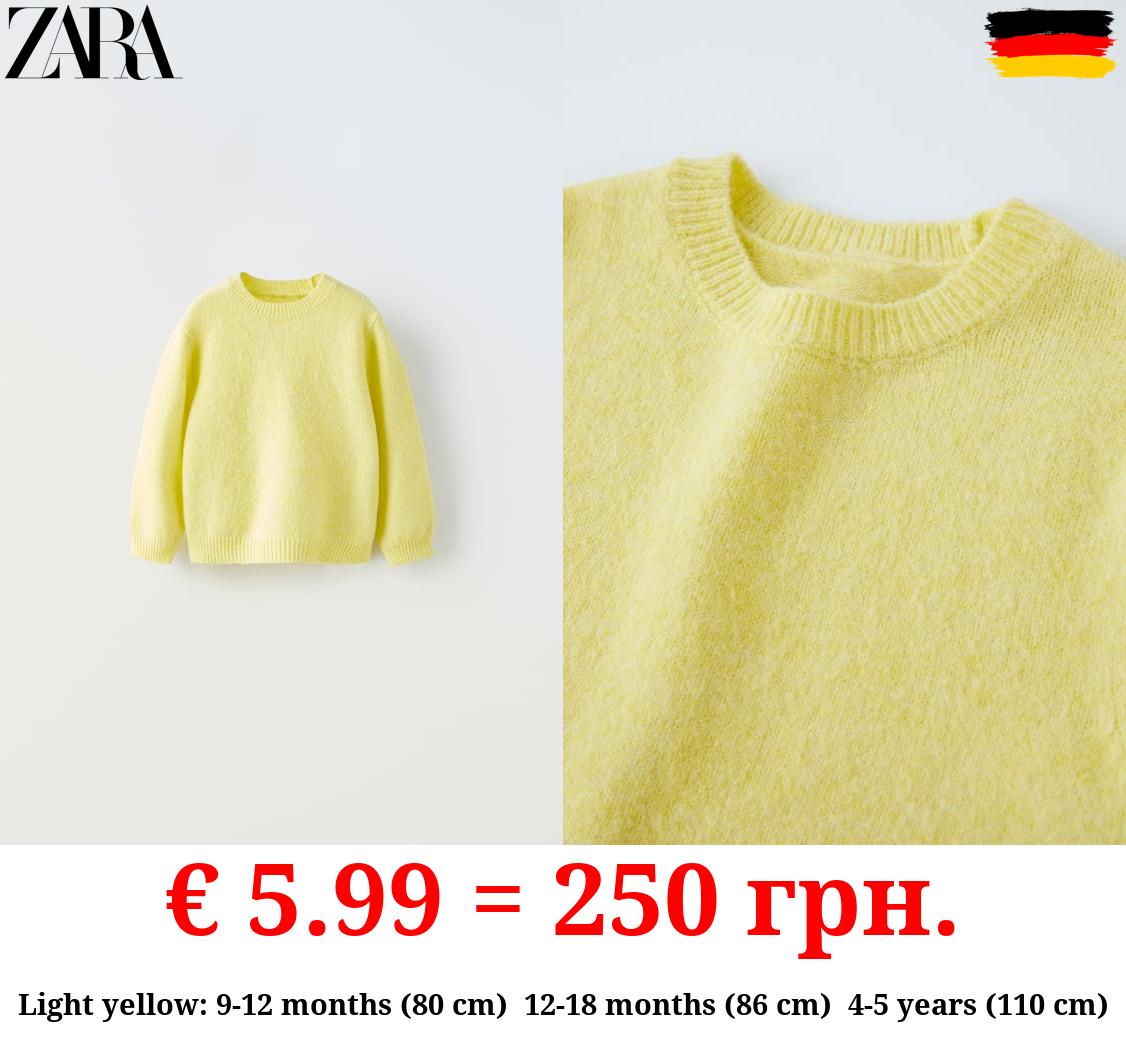 SOFT TOUCH KNIT SWEATER