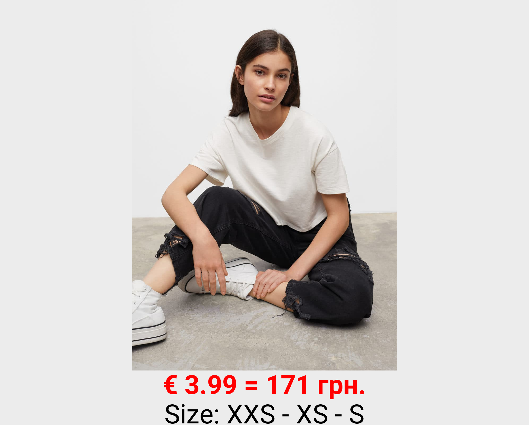 Jeans rectos bajo deshilachado