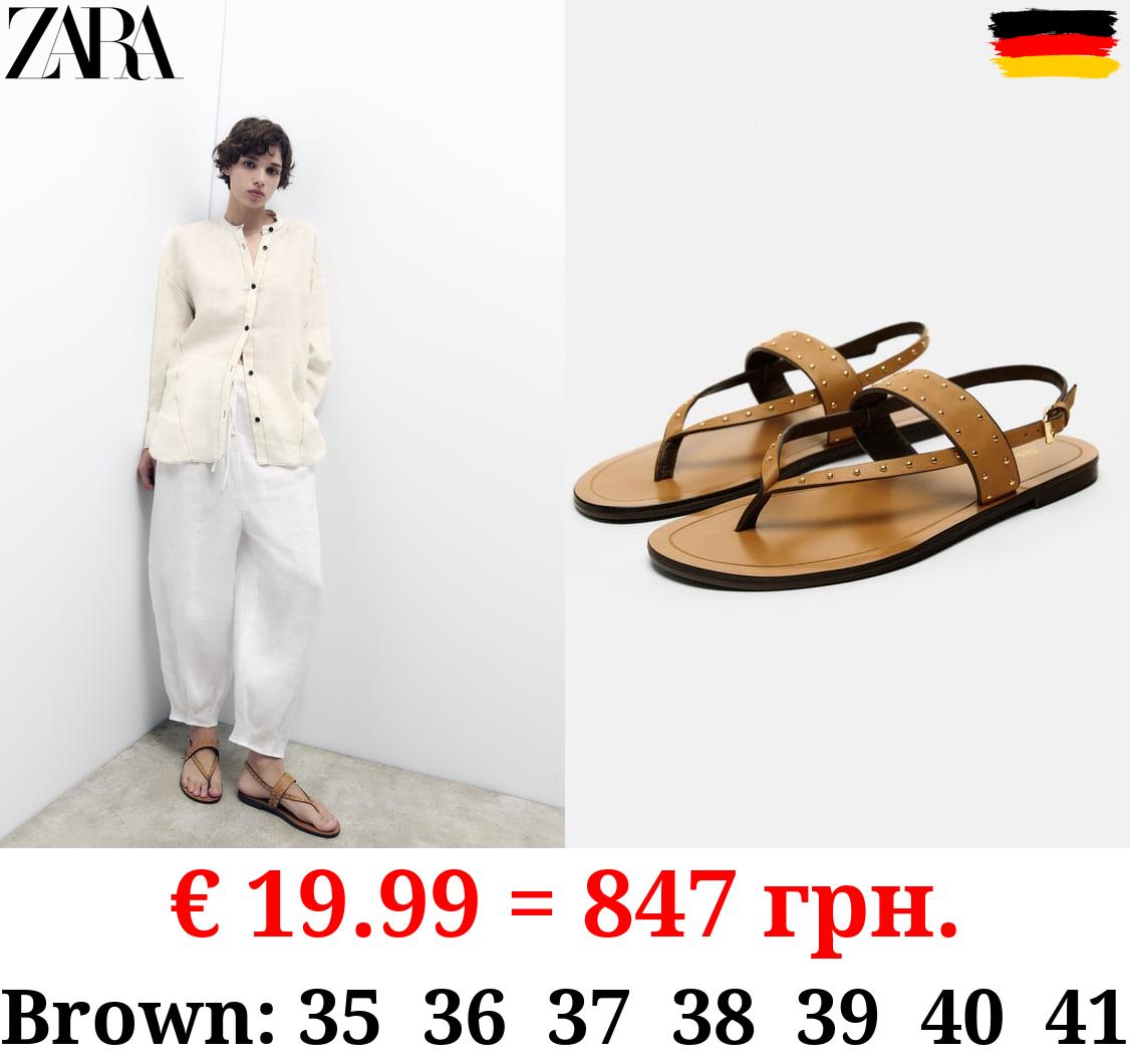 FLAT LEATHER SLIDER SANDALS WITH STUDS