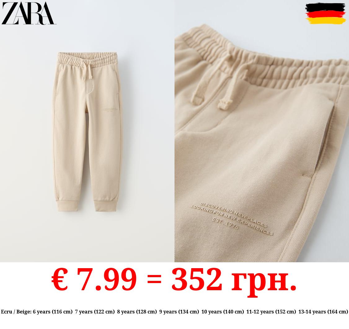 PLUSH TROUSERS WITH SLOGAN