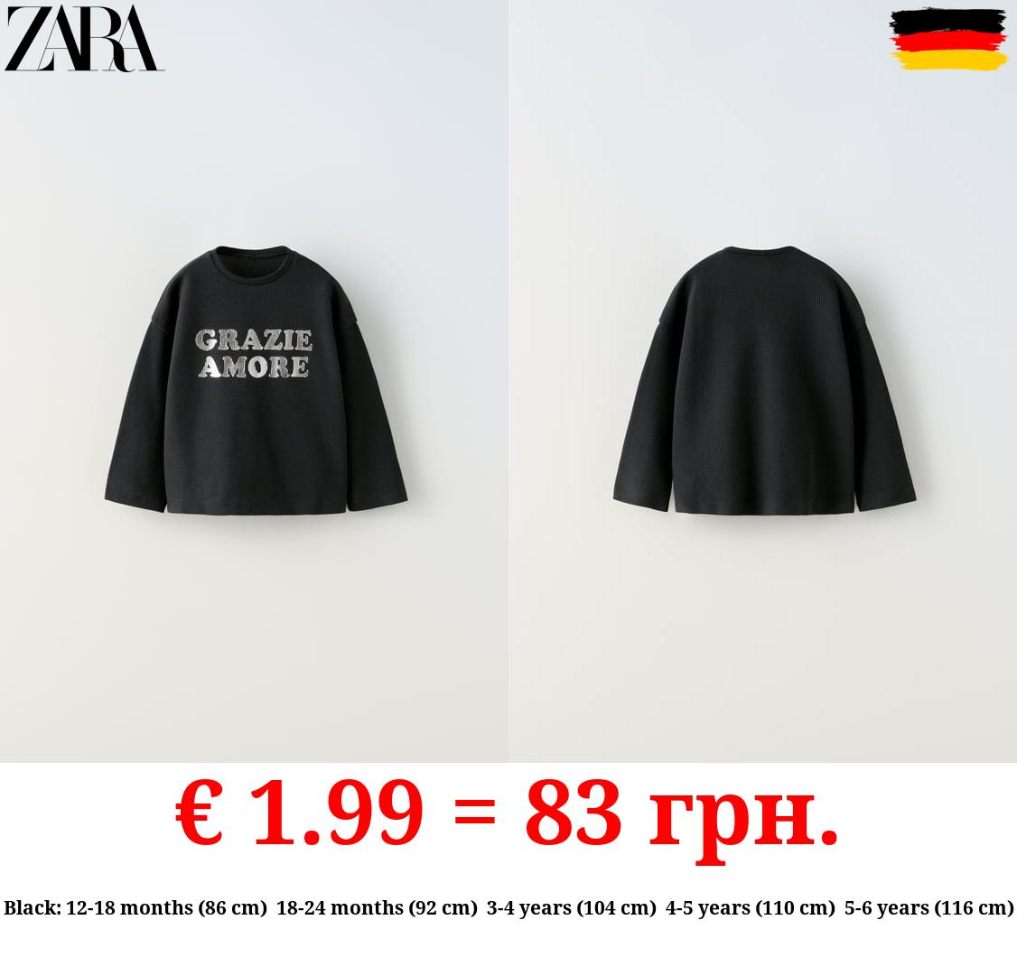 WAFFLE-TEXTURE T-SHIRT WITH SLOGAN