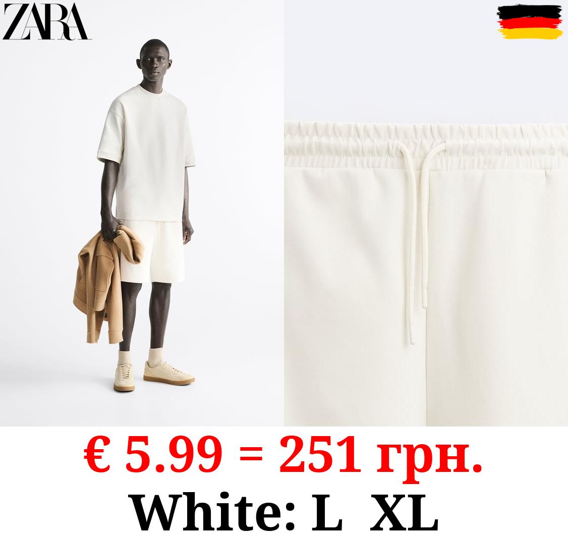 COMPACT JOGGER BERMUDA SHORTS