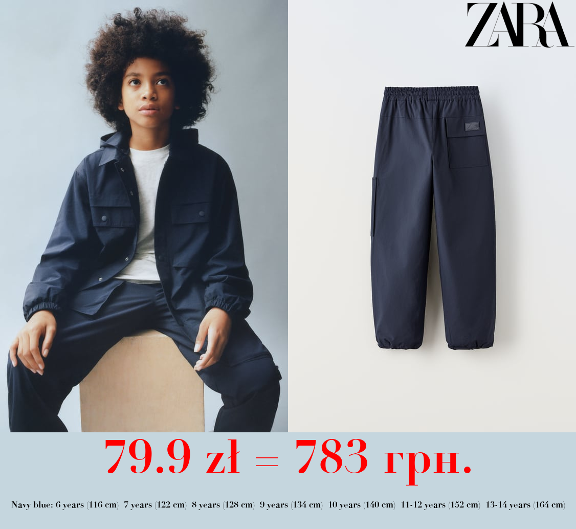 LINED NYLON TROUSERS