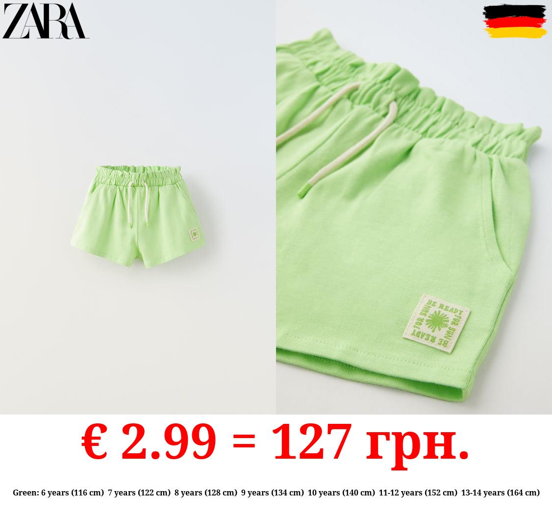 PLUSH BERMUDA SHORTS WITH LABEL DETAIL