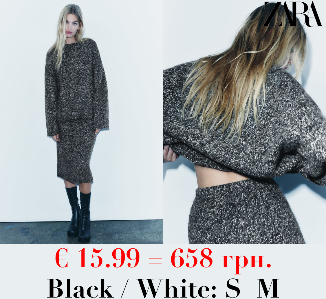 KNIT SWEATER WITH ROLLING TRIMS