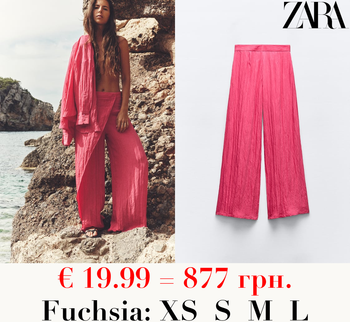 CREASED-EFFECT WRAP TROUSERS