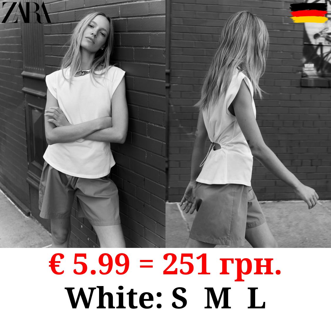 T-SHIRT WITH CUT-OUT AND STOPPER