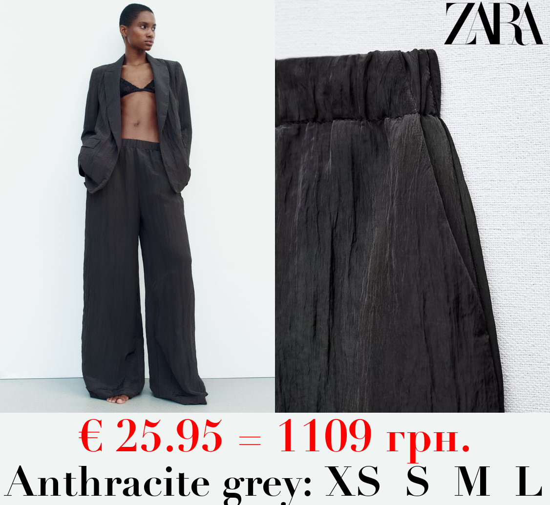 CREASED-EFFECT PALAZZO TROUSERS