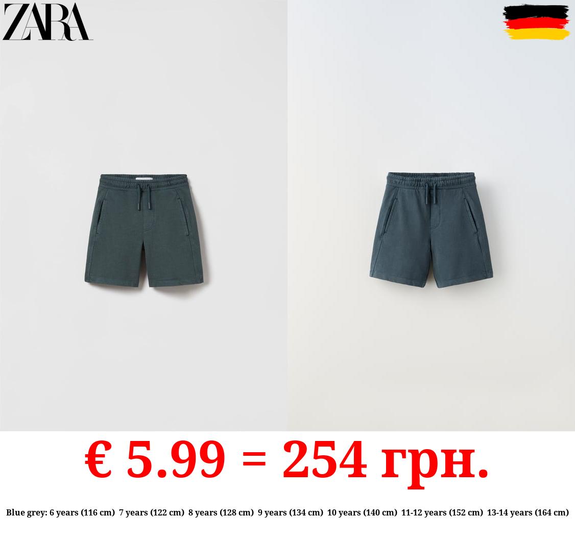 GARMENT-DYED PLUSH BERMUDA SHORTS