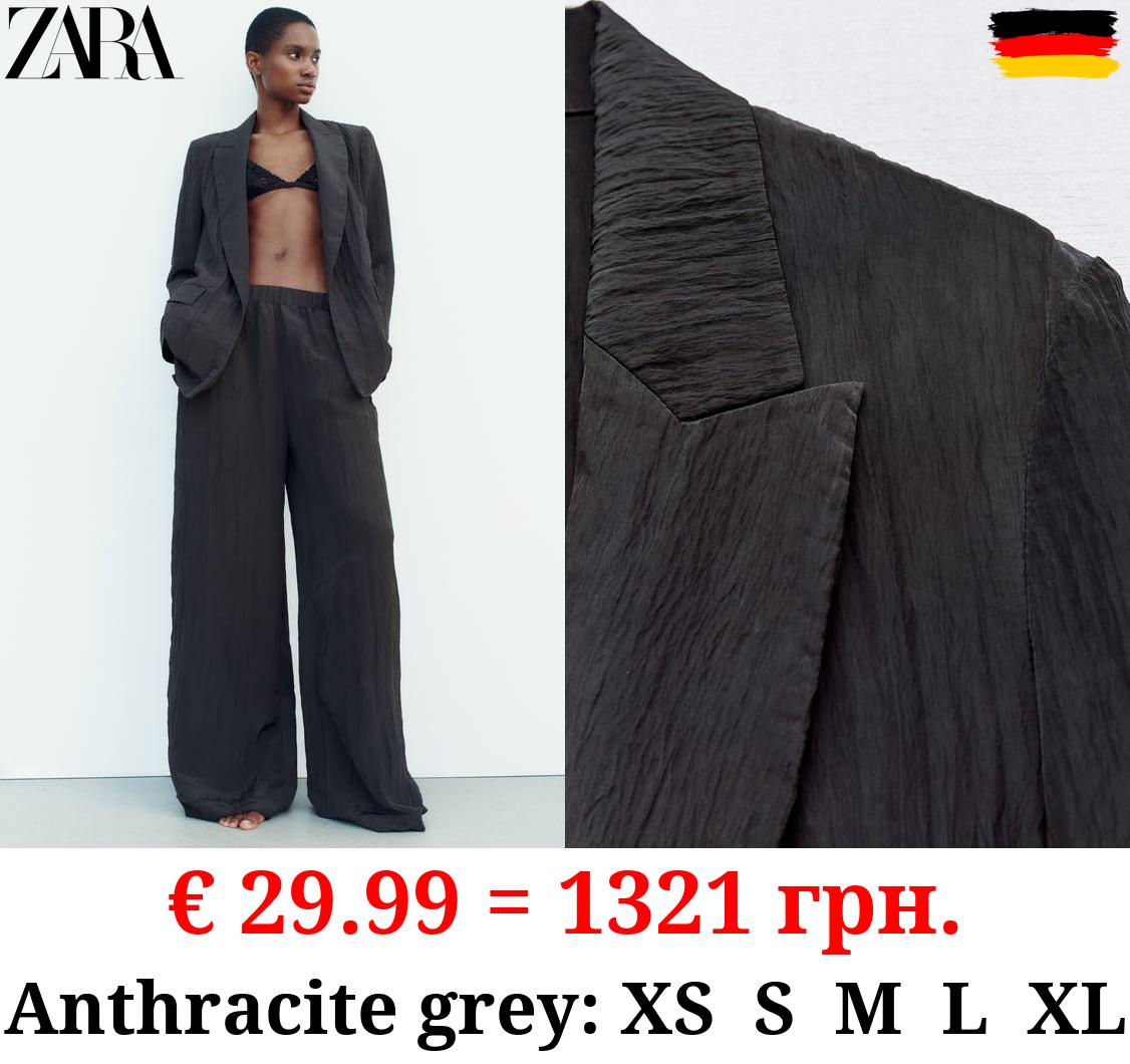 CREASED-EFFECT BLAZER