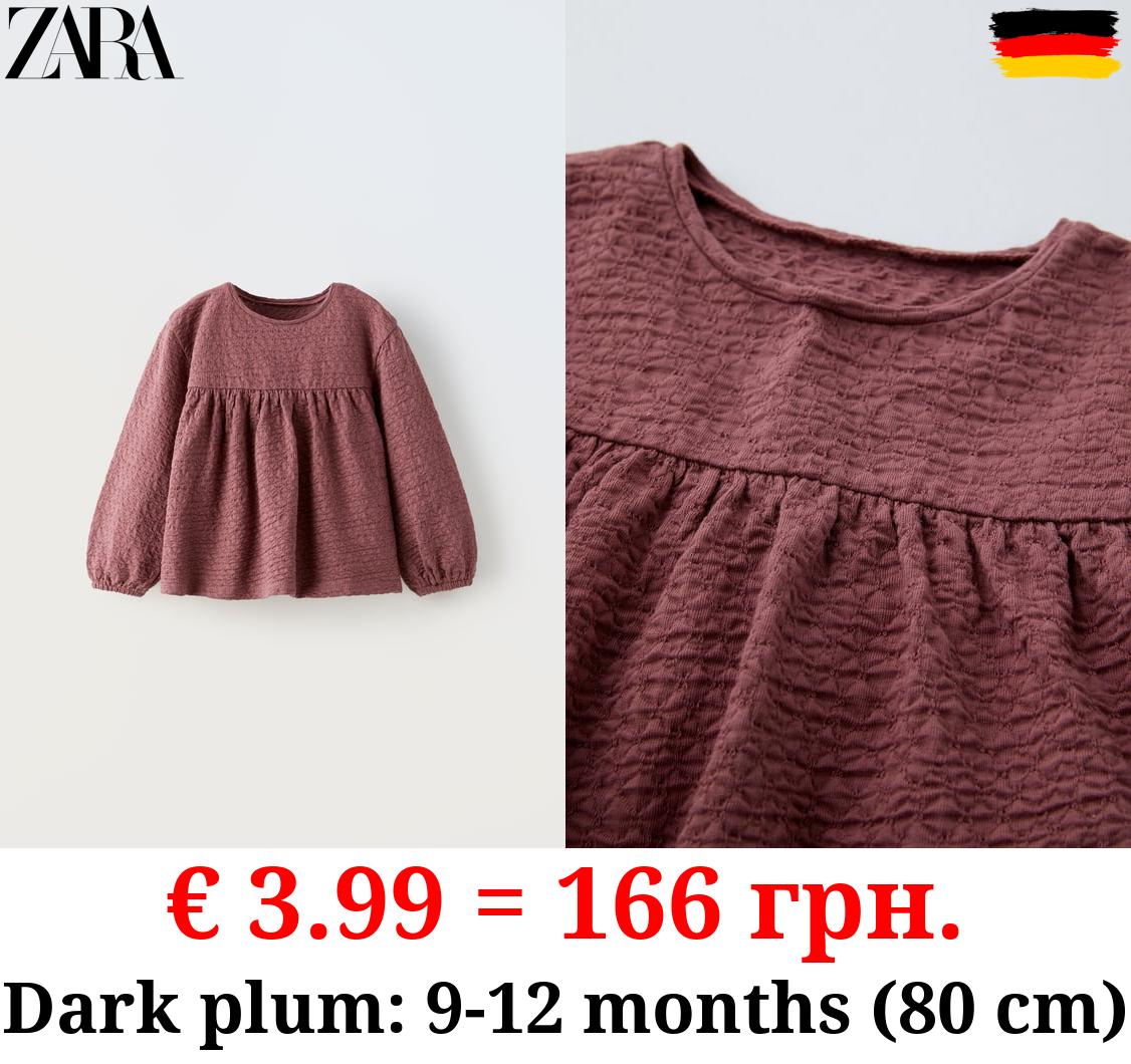 TEXTURED OVERSIZE BLOUSE