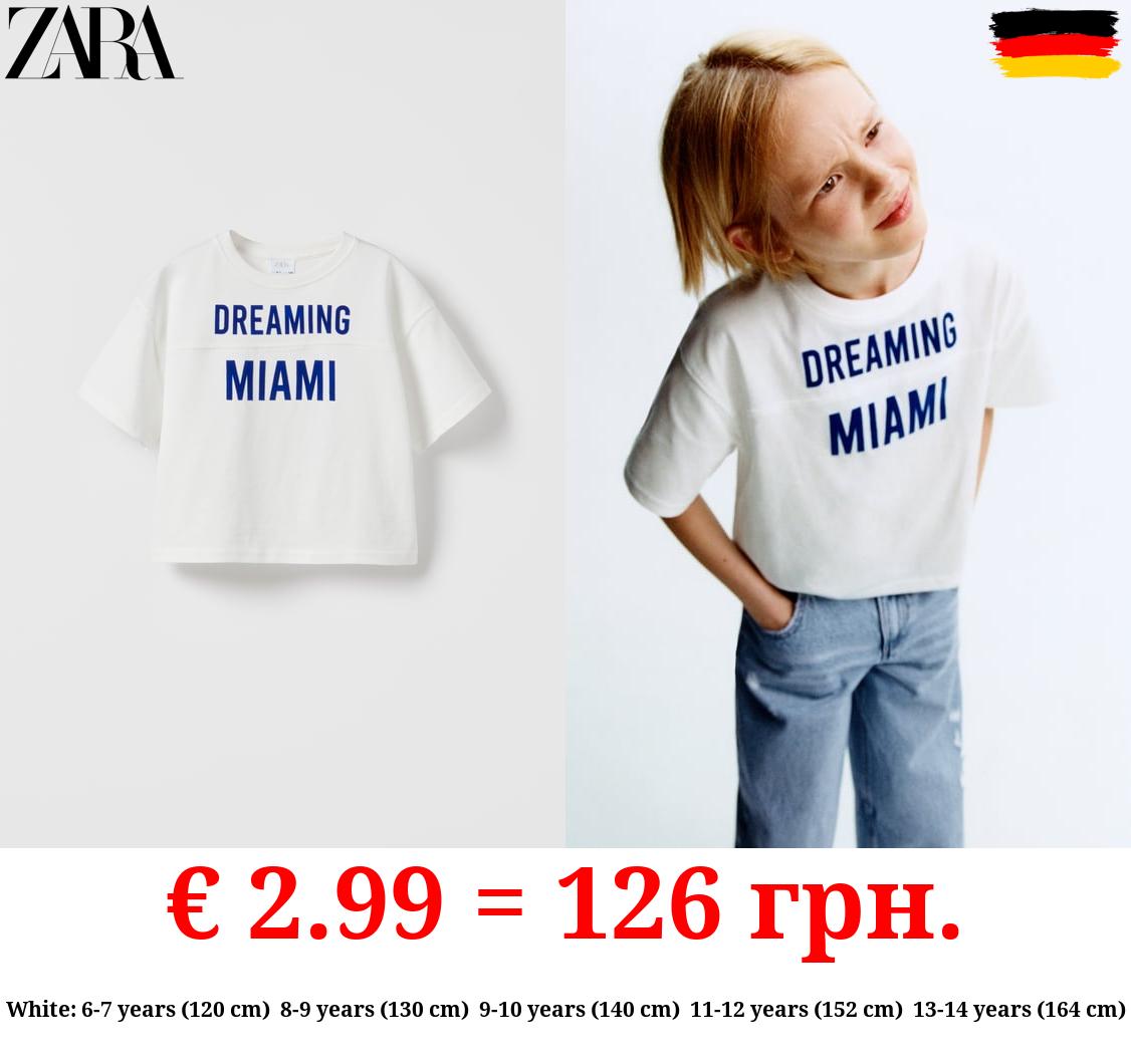 T-SHIRT WITH EMBOSSED TEXT