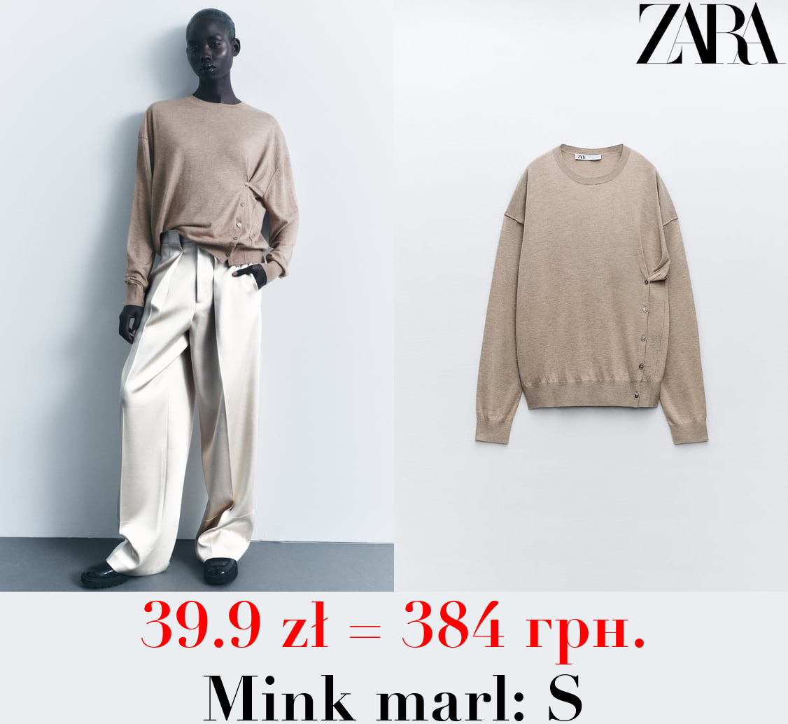 KNIT SWEATER WITH BUTTONS ON THE HEM