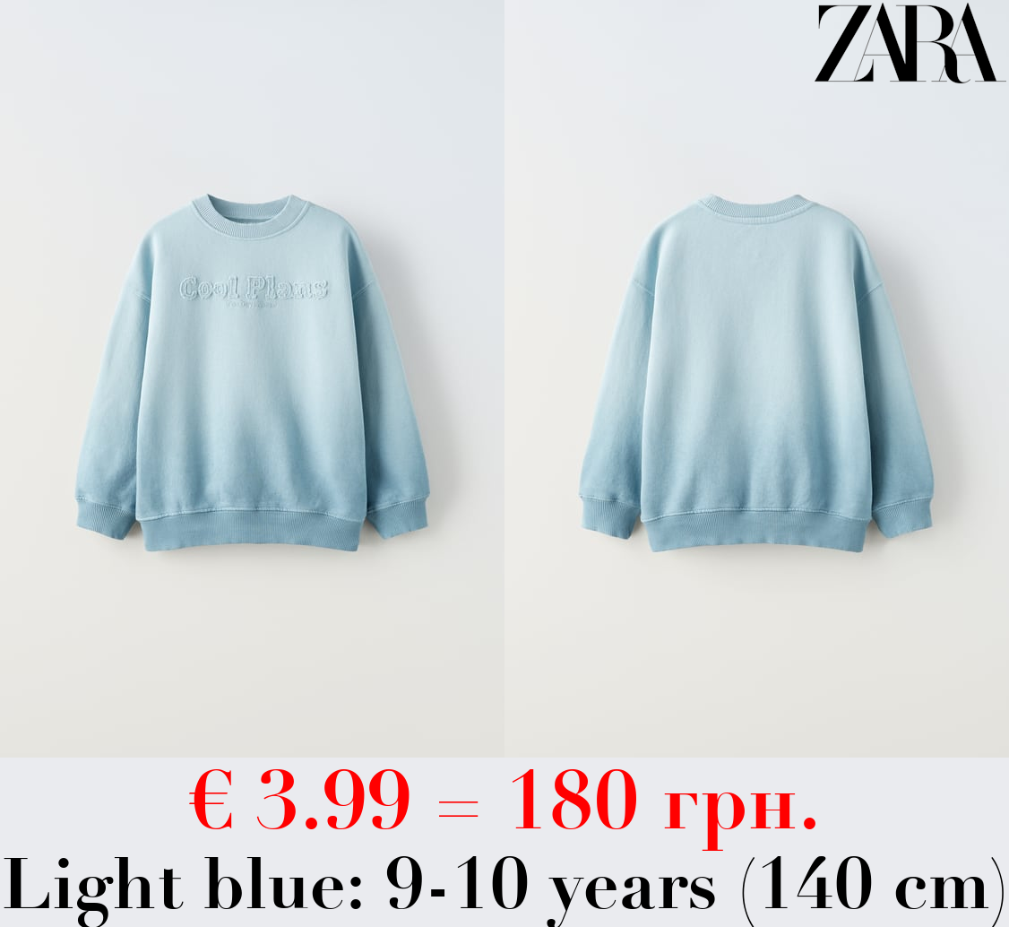 SWEATSHIRT WITH SLOGAN PATCH