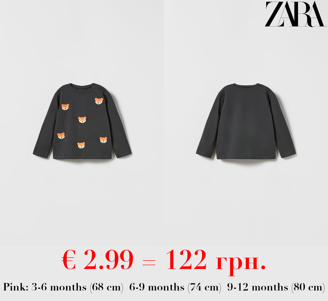 T-SHIRT WITH APPLIQUÉS