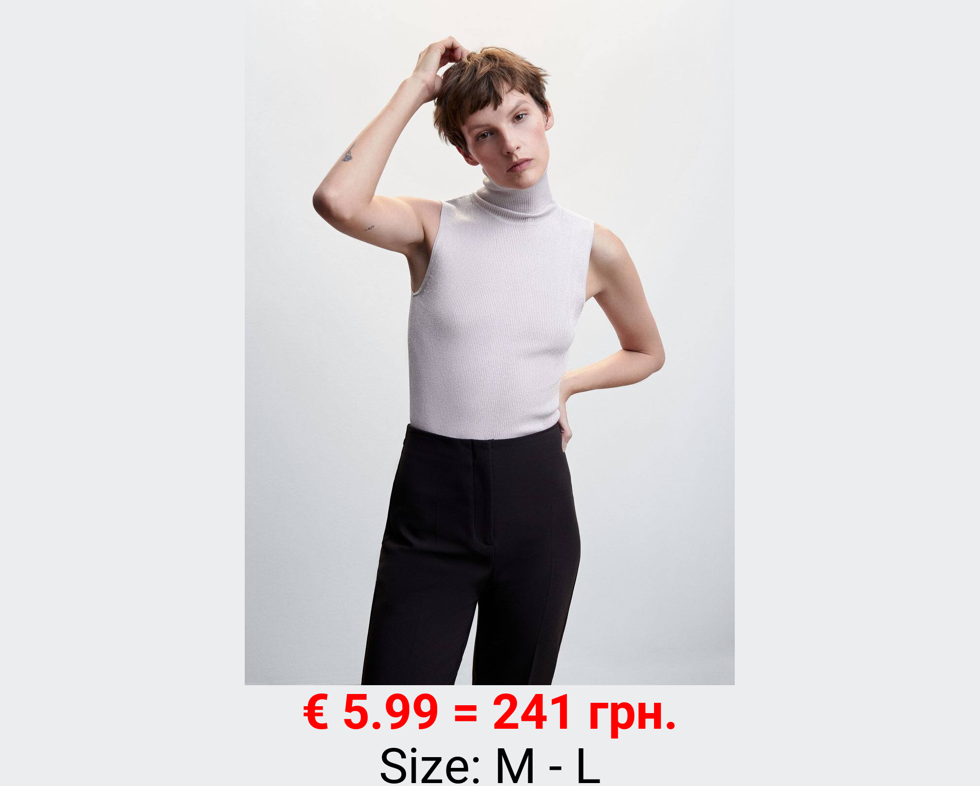 Top punto cuello vuelto