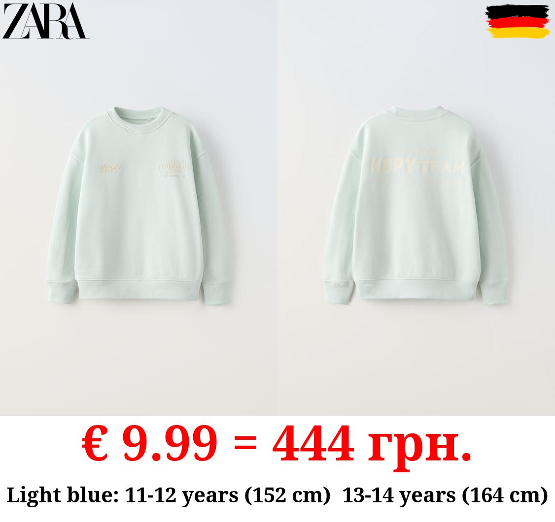 SWEATSHIRT WITH RAISED SLOGAN